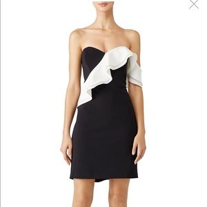Parker Black sheath dress w/ White ruffle